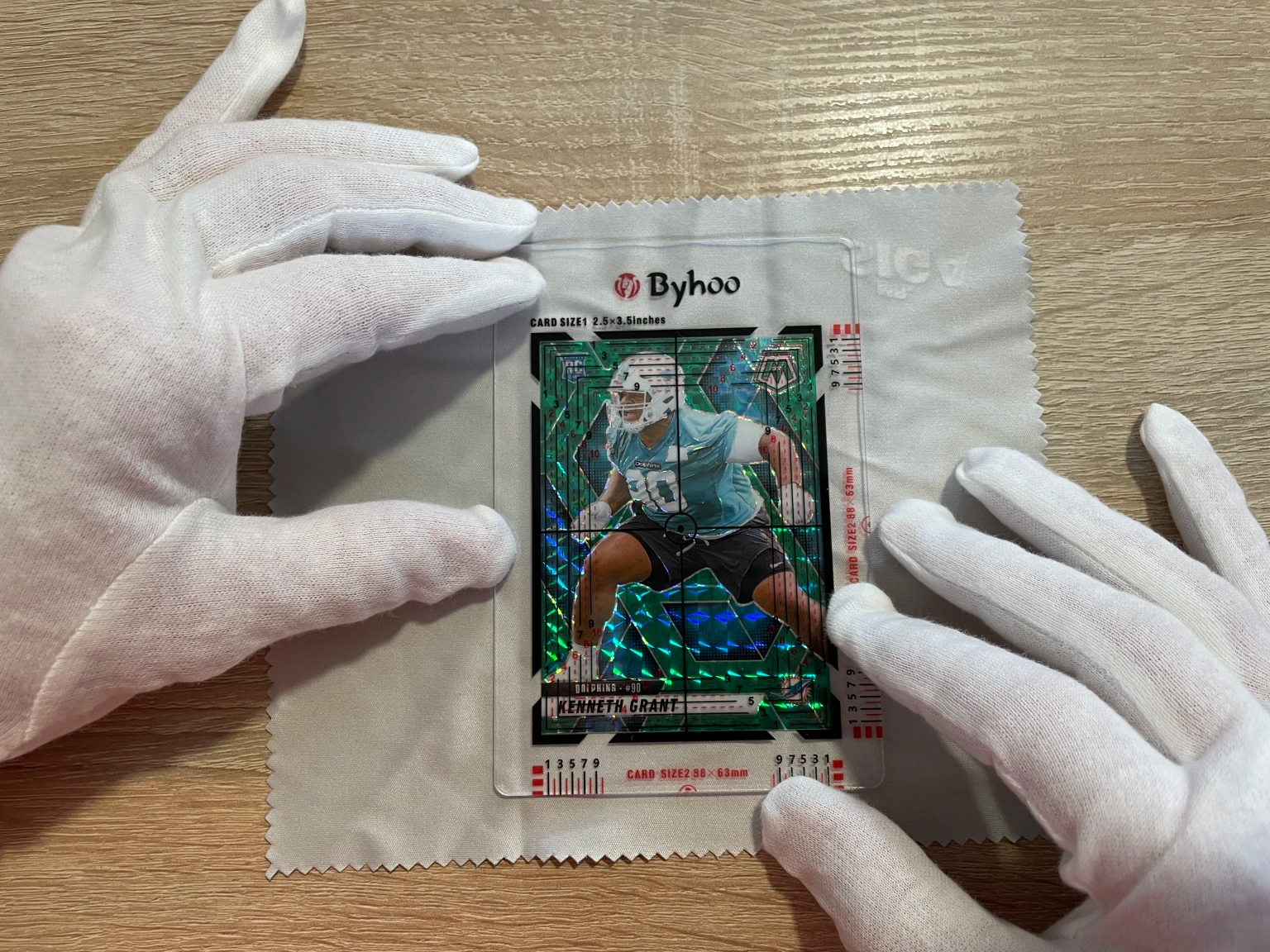 A centering stencil used to evaluate card centering at home