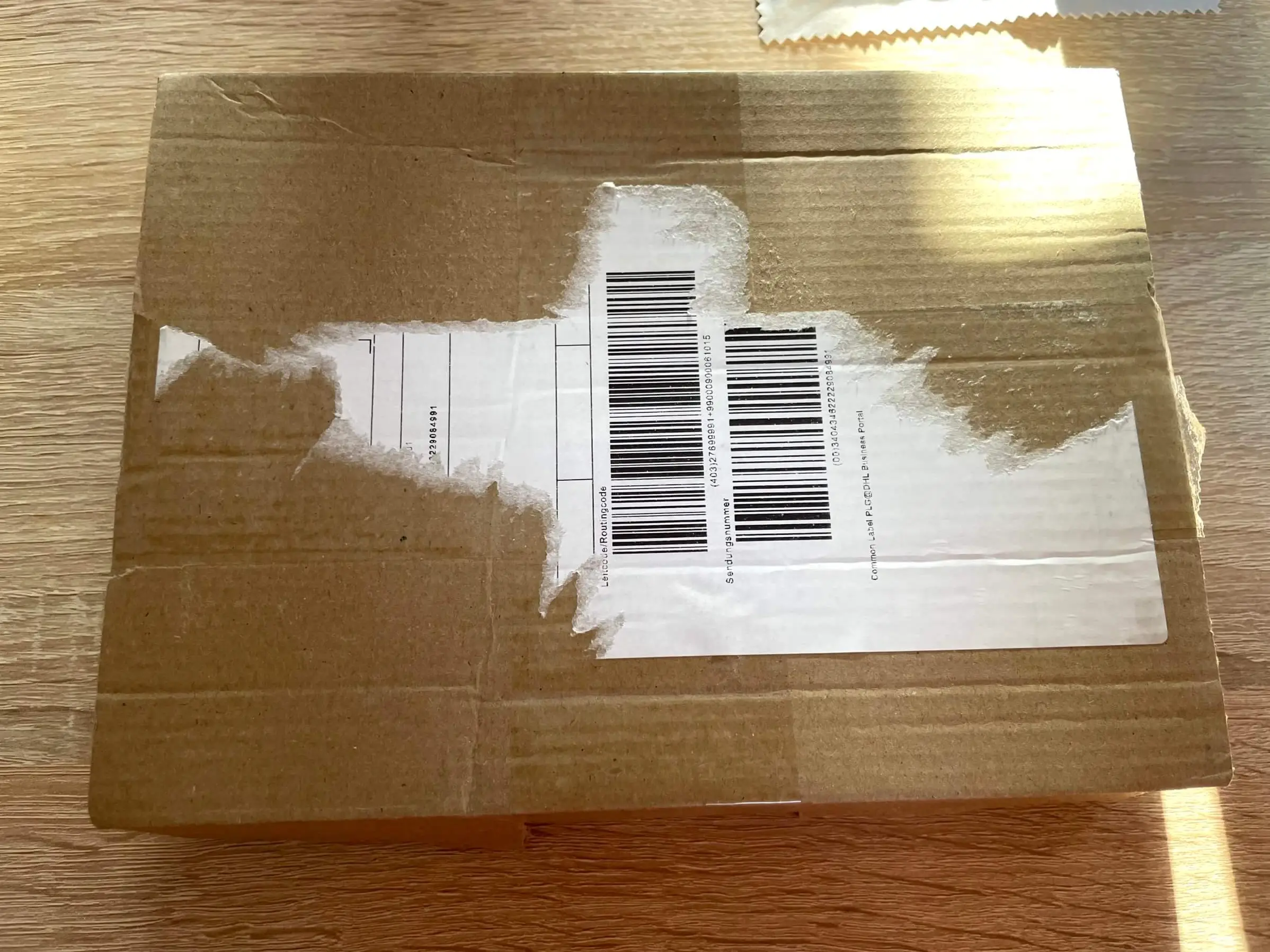 Sealed shipping box with all seams taped securely